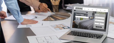 Group of interior architect designer discussing together on blueprint and laptop screen display...