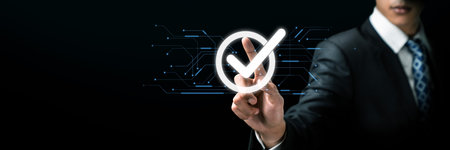 Business person enforces strict quality assurance protocols, ensuring QC and QA standards are met. Achieving certified product excellence through dedicated quality assurance. FaaSの写真素材