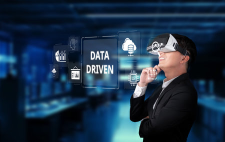 This image showcases a professional engaging with advanced analytics in a modern environment, emphasizing the importance of data-driven decision-making and visualization.の写真素材