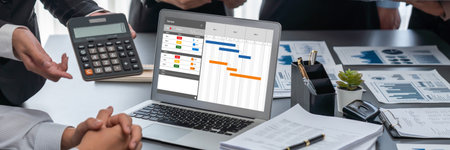 Project planning software for brisk business project management on the computer screen showing timeline chart of the team projectの写真素材