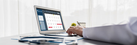 Calendar on computer software application for brisk schedule planning for personal organizer and online businessの写真素材