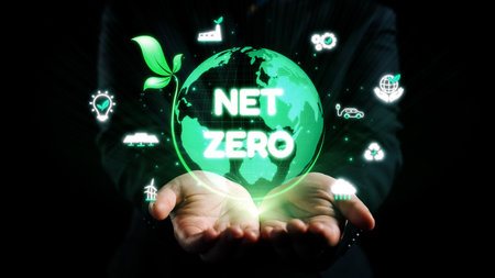 Hands cradle a glowing green globe that symbolizes the net zero initiative, surrounded by icons representing sustainability, innovation, and environmental responsibility.の写真素材