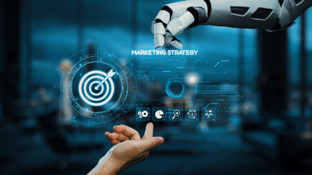 A futuristic robot hand interacts with digital elements showcasing a marketing strategy concept, including a target icon, in a modern office space emphasizing innovation.の写真素材