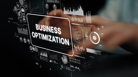 Hands of a professional interacting with a digital interface for business optimization and analytics in a modern workspace. Asymptotic smart data analytic.の写真素材