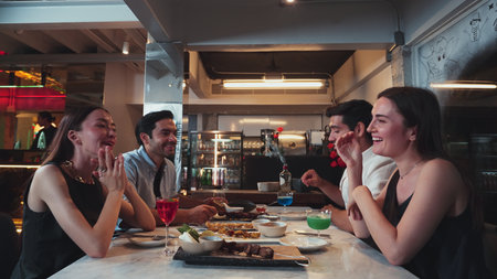 Group friend or couple enjoy drinking cocktail while waitress serving special grill meat tasty...