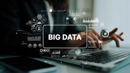Business Professional Analyzing Big Data Insights on Laptop with Graphs and Digital Elements in Modern Office Setting. Asymptotic smart data analytic.の写真素材