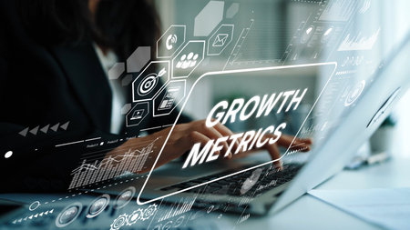Business Professional Analyzing Digital Growth Metrics on Laptop in Modern Office Environment with Technology Graphics Overlay. Asymptotic smart data analytic.の写真素材