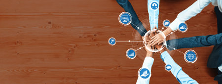 A dynamic image showing diverse hands coming together symbolizing teamwork and collaboration in a...
