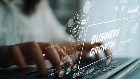Business Growth Concept with Digital Technology and Data Analysis on Computer Keyboard in Modern...