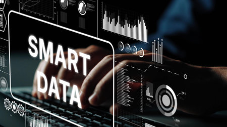 Hands Typing on Keyboard with Smart Data Graphics and Digital Interface in Modern Workspace. Asymptotic smart data analytic.の写真素材