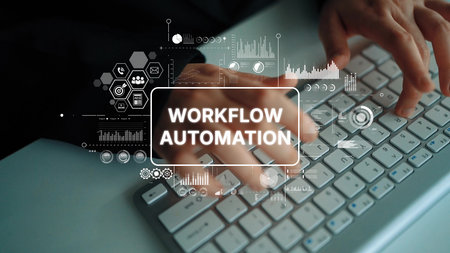 Hands Typing on Keyboard with Workflow Automation Concept and Data Visualization Elements in Modern Office Setting. Asymptotic smart data analytic.の写真素材