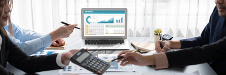 Business intelligence and data analysis concept. Analyst team working on financial data analysis...