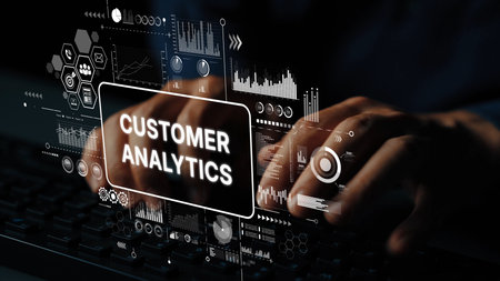 Hands Typing on Keyboard with Customer Analytics Concept and Data Visualization Elements for Business Intelligence and Marketing Strategy. Asymptotic smart data analytic.の写真素材