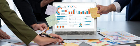 Analyst team use sticky note for creative and analytic brainstorm for business idea with BI data...