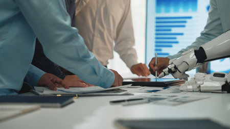 A dynamic collaboration scene where professionals work together with technology and a robotic arm,...
