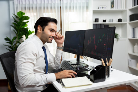 Smart trader businessman analyzing in two dynamic stock exchange investment screen on pc with...