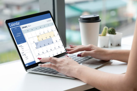 Calendar on computer software application for schedule planning for personal organizer and online business snuglyの写真素材