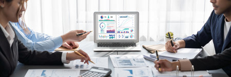 Business intelligence and data analysis concept. Analyst team working on financial data analysis...