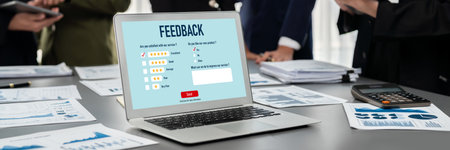 Panorama shot analyst team utilizing BI Fintech to analyze financial report with laptop. Businesspeople analyzing BI data dashboard displayed on laptop screen for business insight. Prodigyの写真素材