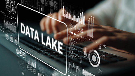 Hands Typing on Keyboard with Data Lake Concept Displayed on Screen Representing Big Data Management and Analysis. Asymptotic smart data analytic.の写真素材