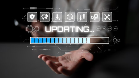 Knowledge upgrade and software updates support digital skills growth, competitiveness, and continuous learning to stay current with new tech trends.の写真素材