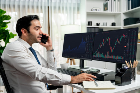 Trader businessman calling to consultant or partner with two stock exchange investment, compare data...