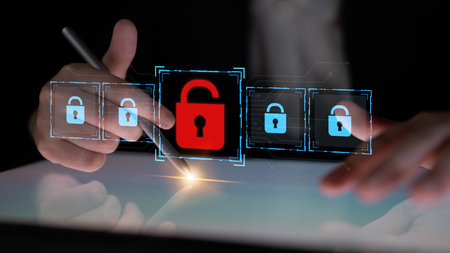 Digital security concept illustrating a cybersecurity breach, with a red unlocked padlock indicating...