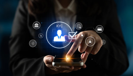 Digital KYC verification with biometric scan, ID authentication, and financial security icons representing identity verification, secure onboarding, fraud prevention, and complianceの写真素材
