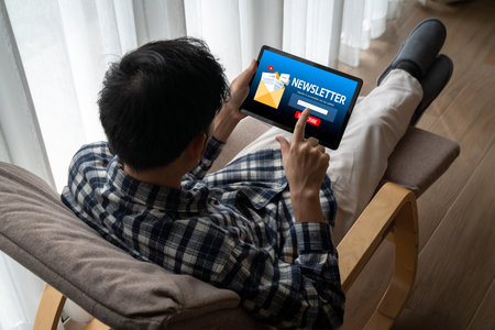 newsletter signup page on computer for customer to subscribe snugly newsletter update information to subscriberの写真素材