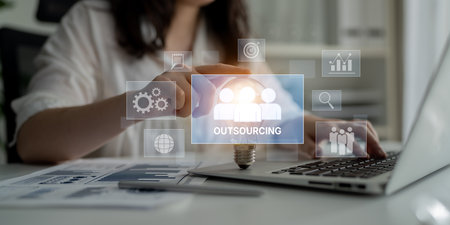 Outsourcing concept showing collaboration, delegation, global workforce, productivity, and task...