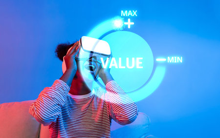 A dynamic scene showcasing an individual immersed in virtual reality to explore business growth strategies, emphasizing the importance of value maximization in today competitive market.の写真素材