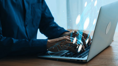 Person Working on Laptop with Digital Interface and Connectivity Graphics, Technology Concept,...