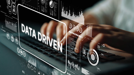 Hands Typing on Keyboard with Graphs and Data Analytics Visuals Emphasizing Data Driven Insights and Technology Trends. Asymptotic smart data analytic.の写真素材