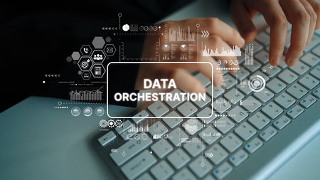 Modern Data Orchestration Concept with Hands Typing on Keyboard and Digital Graphs Representing Data...