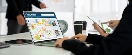 Online real estate rental search snugly on computer. House home or apartment rental website online.