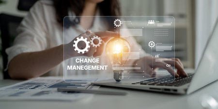 Change management strategy combining innovation, globalization, and teamwork to enable business transformation and emotional engagement in modern organizationsの写真素材