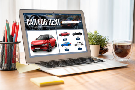 car rental website on computer screen for tourist to rent a car for transportation snuglyの写真素材