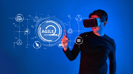 A person engages with virtual reality technology, showcasing agile methodologies in a dynamic digital environment. Explore the intersection of innovation and user experience.の写真素材