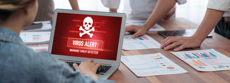 Virus warning alert on computer screen detected brisk cyber threat , hacker, computer virus and malwareの写真素材