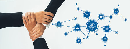 Two hands meet in a symbolic gesture of partnership, surrounded by digital icons that represent various aspects of e-commerce and modern business connectivity. Amityの写真素材