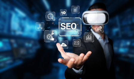 A businessman wearing virtual reality glasses interacts with digital icons representing SEO and marketing strategies, showcasing innovation in a tech-driven environment.の写真素材