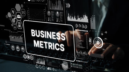 Business Metrics Dashboard with Data Visualization and Analytical Insights on Digital Screen by Hands Typing. Asymptotic smart data analytic.の写真素材