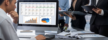 Business intelligence and data analysis concept. Analyst team working on financial data analysis dashboard on laptop screen as marketing indication for effective business strategic planning. Insightの写真素材