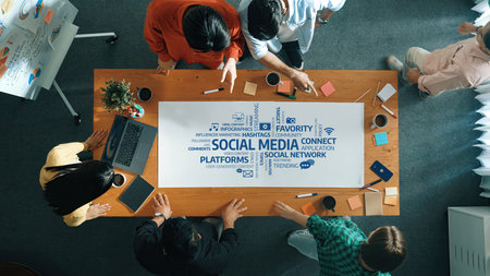 A diverse group of individuals engages in a dynamic discussion about social media strategies and...