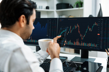 Trader businessman holding coffee cup focusing on dynamic on phone, stock exchange investment screen...