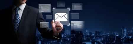 Business person checking email inbox, organizing and prioritizing messages for better productivity. Learn smart email techniques for effective communication. FaaSの写真素材