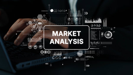Hands Typing on Laptop with Market Analysis Graphics and Data Visualizations Overlay for Business Insights. Asymptotic smart data analytic.の写真素材
