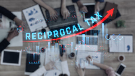 Team Meeting Discussing Reciprocal Tax Strategies with Graphs and Data on Table for Financial Analysis and Economic Planning. Consignment.の写真素材