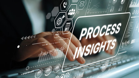 Hands Typing on Keyboard with Digital Analytics Graphics Representing Process Insights and Business Intelligence Concepts. Asymptotic smart data analytic.の写真素材