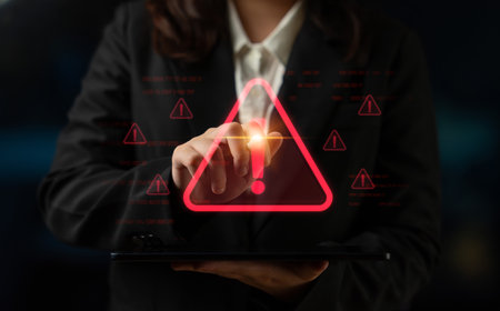 Cybersecurity alert warning showing red cyber for data breach, network threat, and cyber security system vulnerability with emphasis on security risk, caution, digital protectionの写真素材